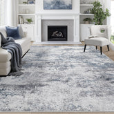 Aelenmu front view of blue grey rug showing overall pattern and fit on floor