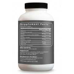 Ancestral Supplements cápsulas dispersas sobre mesa, fácil dosificación y toma