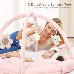 ANGELBLISS hanging toys detail showing colorful sensory toys that encourage reaching