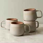 Ava Nord front view of four 12 oz mugs showing sage ash finish and stackable shape