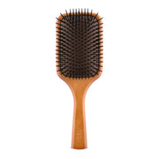 Aveda cepillo pala frontal mostrando superficie amplia y control