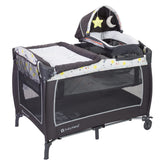 Baby Trend front view showing bassinet, changer, and toys for versatile use