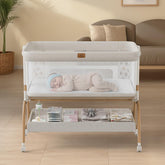 BabyBond bassinet front view showing stable base and beige finish for secure sleep
