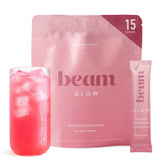 BEAM Glow frente del empaque mostrando sabor frambuesa y 15 porciones, apoyo diario