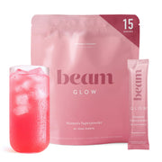 BEAM Glow frente del empaque mostrando sabor frambuesa y 15 porciones, apoyo diario