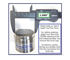 Bearing Buddy 1980A instalado en rueda de remolque protegiendo contra agua y suciedad