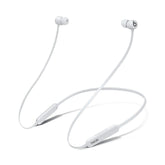 Beats Flex vista frontal del embalaje mostrando color smoke gray y diseño compacto