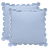 BEBE BASK front view of sky blue pillow covers showing elegant scallops and color