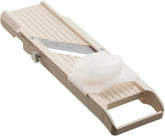 Benriner mandoline front view showing full beige body and blade benefit speed