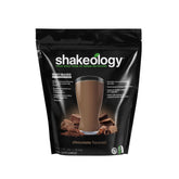 BODi envase Shakeology Chocolate al frente mostrando diseño y conveniencia