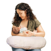 Boppy nursing pillow luxe front view showing ergonomic shape and support