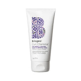 Briogeo envase frontal de la crema leave-in muestra diseño y uso práctico