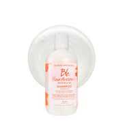 Bumble and bumble botella frontal mostrando diseño profesional y beneficio hidratante