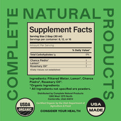Vaso con agua y tintura Complete Natural Products listo para mezclar y beber