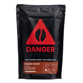 Danger Coffee front packaging showing bag and branding, highlighting clean sourcing benefit