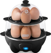 DASH front view of egg cooker showing compact black exterior and button, saves counter space