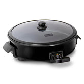 DASH electric skillet front view showing sleek black design and lid, easy family cooking