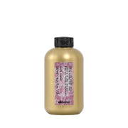 davines curl-building serum front packaging showing product benefit of defined curls