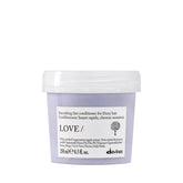 Davines botella frontal 250 ml mostrando diseño y beneficio anti-frizz