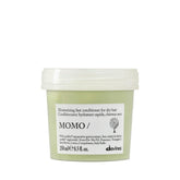 Davines frasco MOMO frente mostrando diseño y beneficio hidratación inmediata