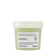 Davines frasco MOMO frente mostrando diseño y beneficio hidratación inmediata
