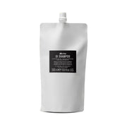Davines OI champú frente del envase, muestra acabado brillante