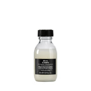 Davines OI champú frontal tamaño viaje mostrando diseño práctico