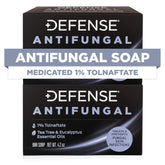 Defense Soap vista frontal del empaque mostrando el paquete doble y uso práctico