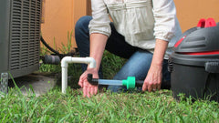 Diyvac attachment in use on AC drain reducing service time and effort