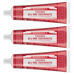 Dr. Bronner's tubo frontal canela mostrando envase y beneficio limpieza natural