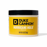 Duke Cannon pomada frontal del envase mostrando tamaño y diseño elegible