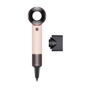 Dyson travel hair dryer front view showing compact design and portability