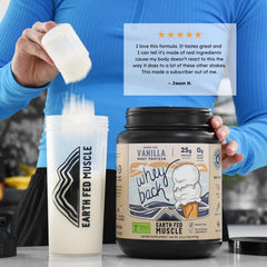 Earth Fed Muscle shake mixing in glass for fast recovery and smooth blend