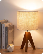EDISHINE lamp front view showing compact tripod and warm glow benefit
