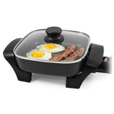 Elite Gourmet EG808 vista frontal con asas y acabado negro mostrando beneficio de ahorro de espacio