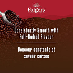 Folgers lata abierta con cuchara midiendo café para preparación rápida