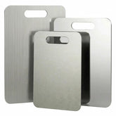Generic stainless steel cutting boards front view showing three sizes and durable design