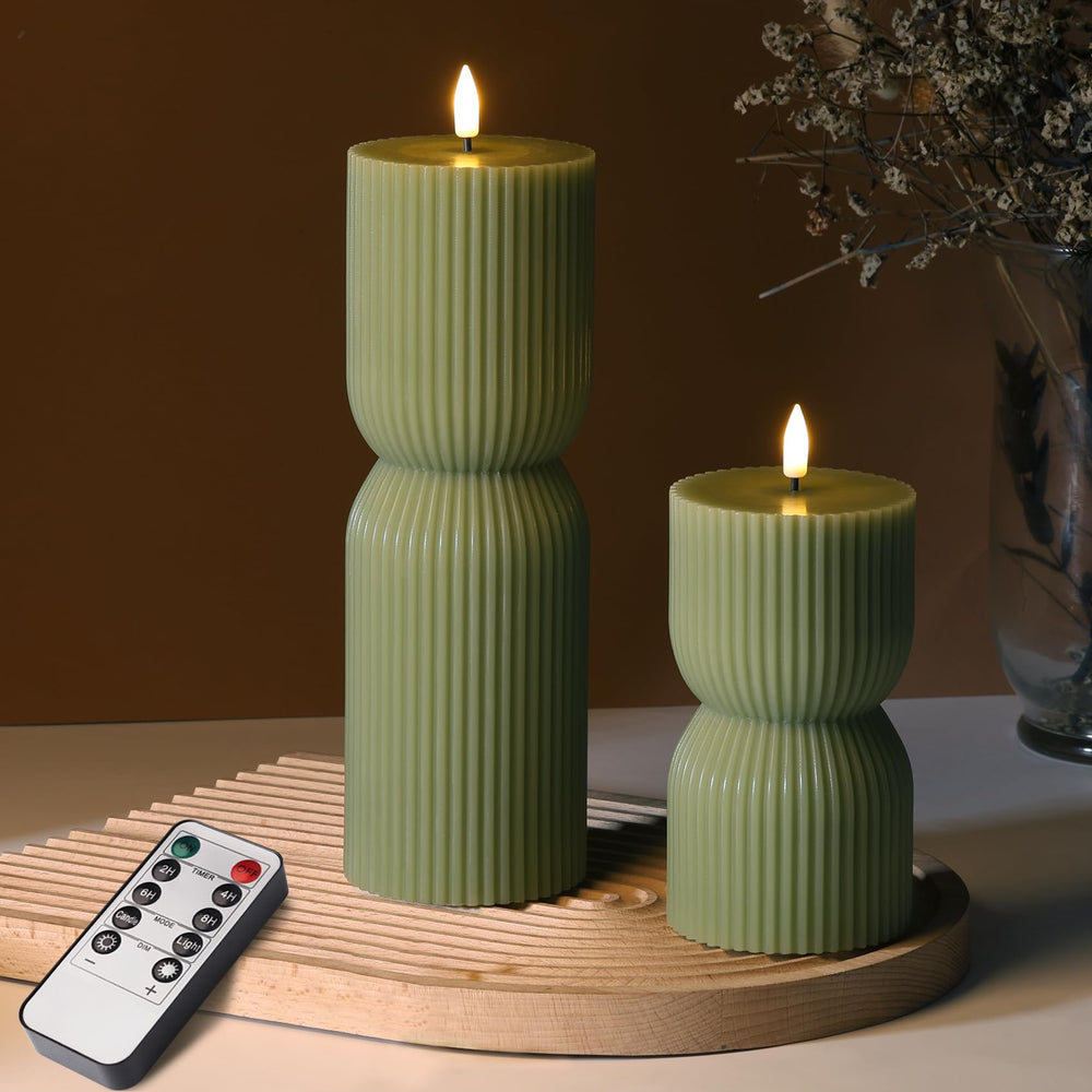 Girimax front view of two olive green pillar candles showing realistic wax finish and color benefit