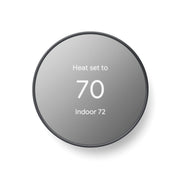 Google Nest thermostat front view showing charcoal finish and compact design for modern homes