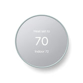 Google Nest thermostat front view showing clean design and energy savings