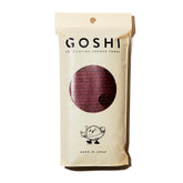 GOSHI toalla exfoliante frontal en rojo mostrando largo y forma, facilita alcance total