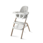 Graco front view of high chair showing compact design and stylish wood grain