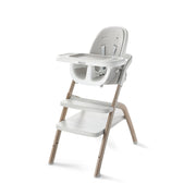 Graco front view of high chair showing compact design and stylish wood grain