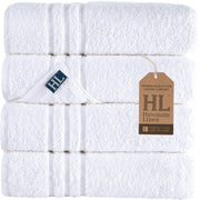 Hawmam Linen front view of four white towels highlighting neat packaging and value