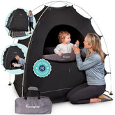 Hiccapop front view showing blackout cover fitting playard and providing darkness
