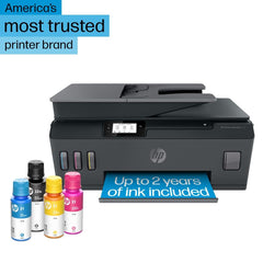 HP Smart Tank Plus 570 ink tank closeup showing transparent reservoir for monitoring ink