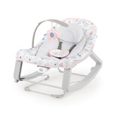 Ingenuity front view of bouncer showing neutral Pink Burst and compact frame for easy placement