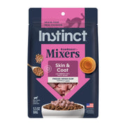 Instinct paquete frontal mostrando topper liofilizado y beneficios nutricionales
