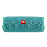 JBL Flip 5 teal front view showing speaker grille and bold design that delivers powerful sound