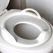 Jool Baby front view of gray potty seat showing secure design and comfy rim
